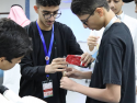 Saudi students doing experiment at The Academic Talent Enrichment Program.